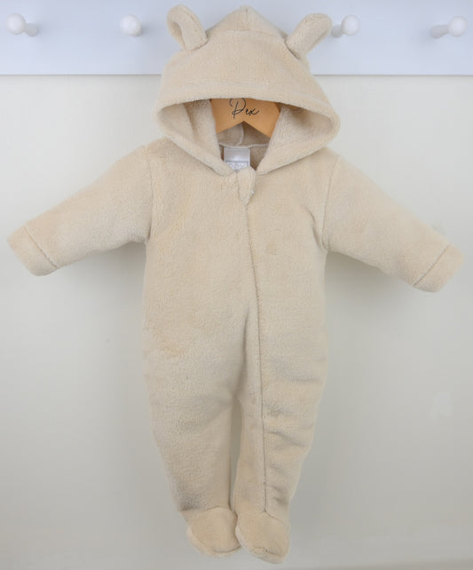 Beige baby snowsuit with bear ears on a white background